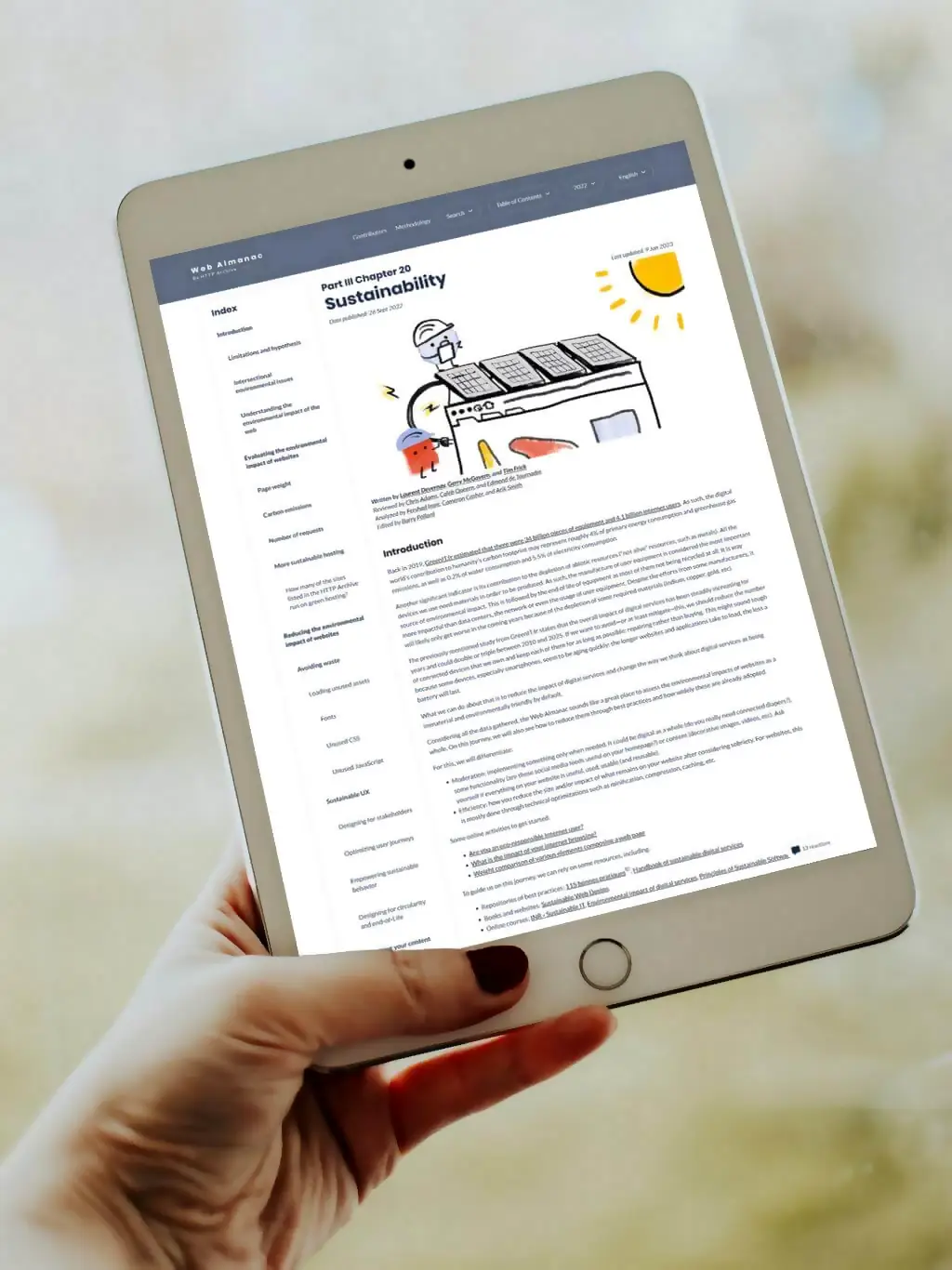 Person holding iPad with Web Almanac article on Sustainability
